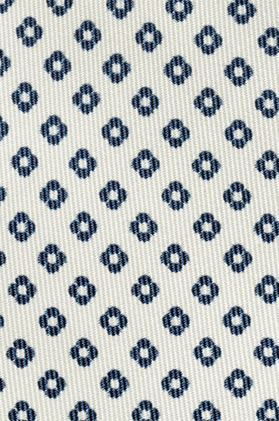 White silk with navy geo flower print tie