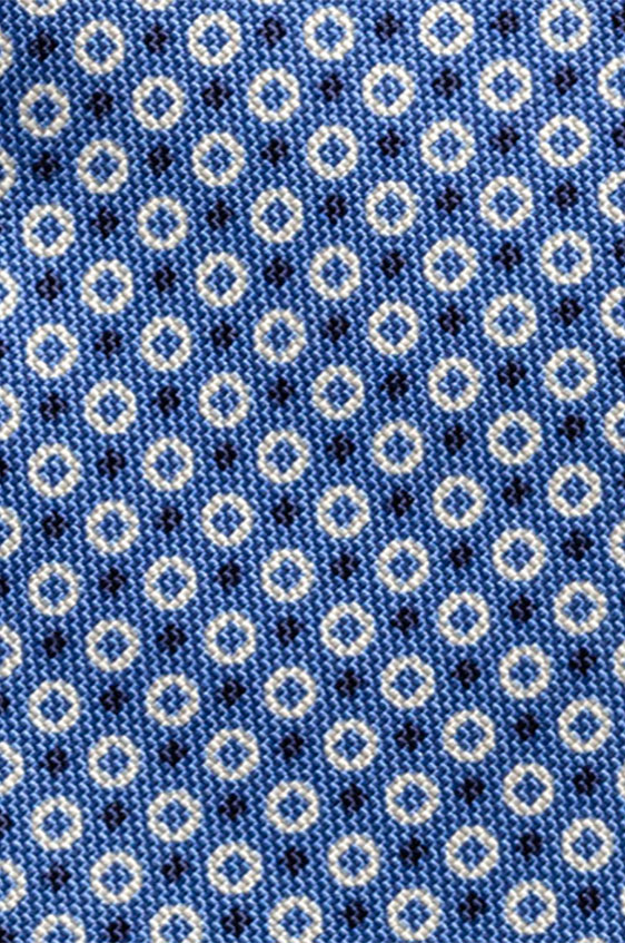 Bright blue silk with white-navy dot print tie
