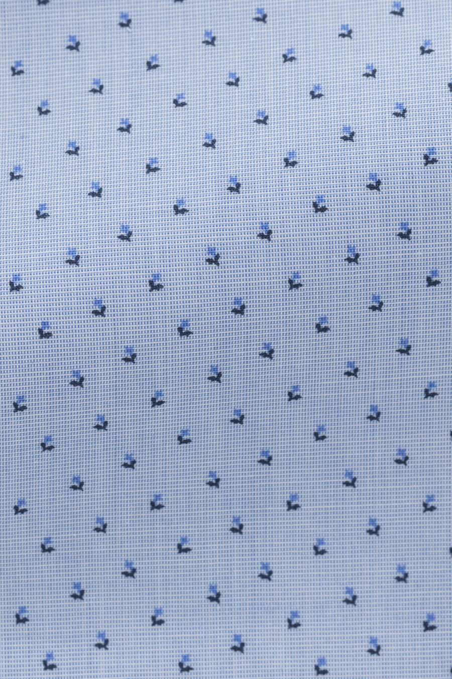 Light blue cotton poplin with navy blue floral dot print
