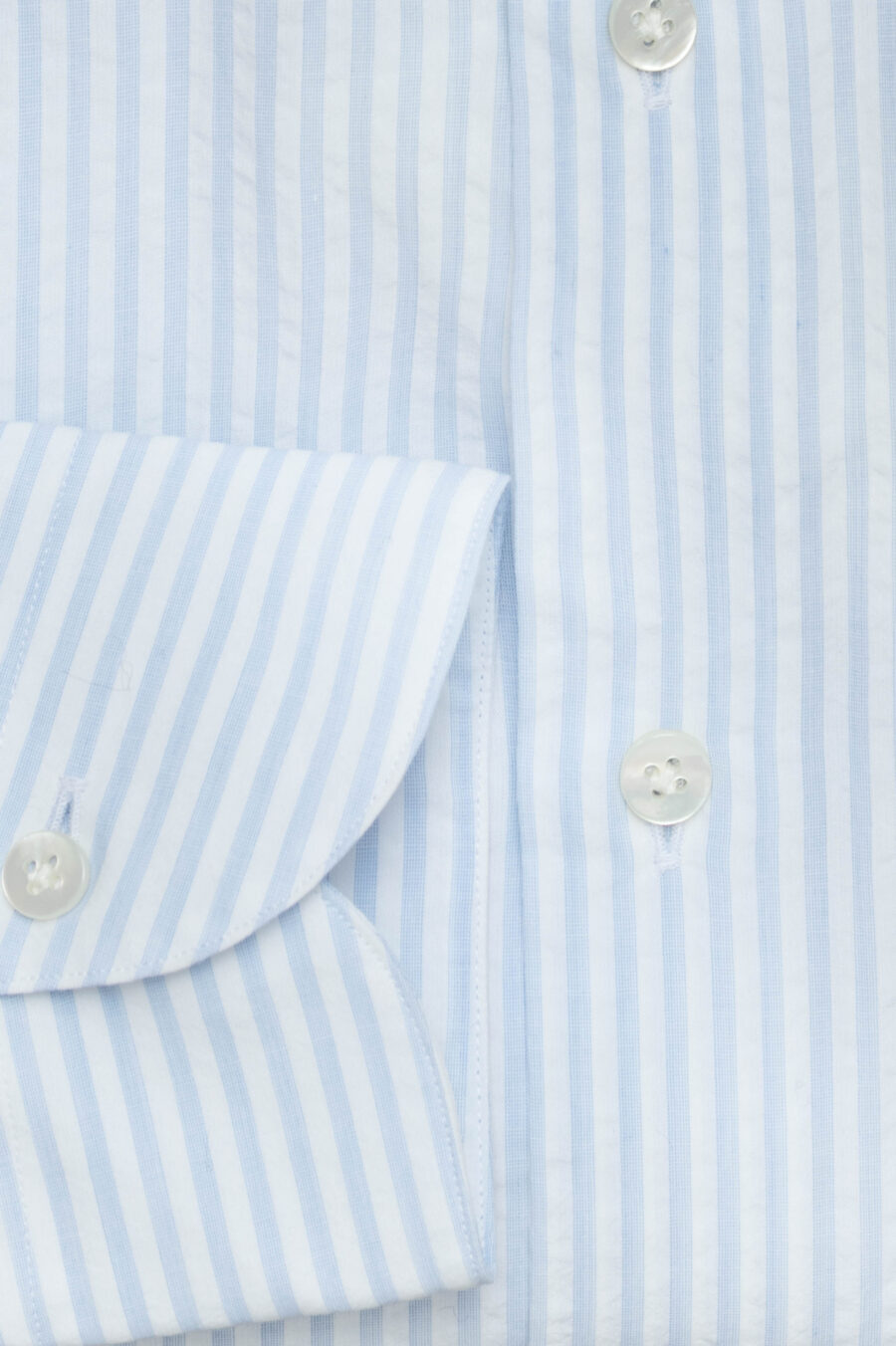 White cotton seersucker with light blue stripes